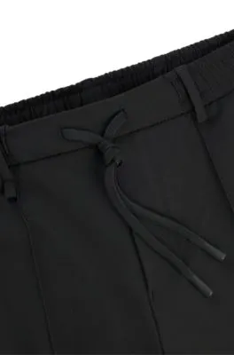 Pantalones cargo de tejido elástico repelente al agua