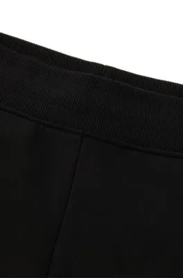 Pantalones de chándal en felpa de algodón con logo apilado