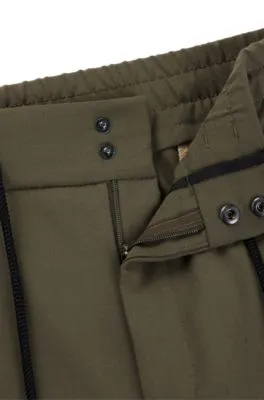 Pantalones de tejido técnico elástico con cordón