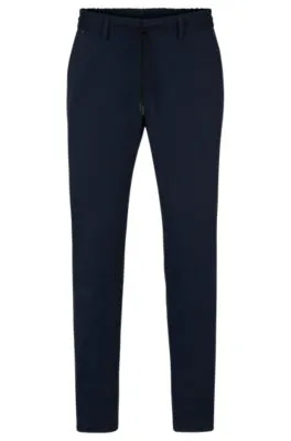 Pantalones slim fit de punto técnico elástico