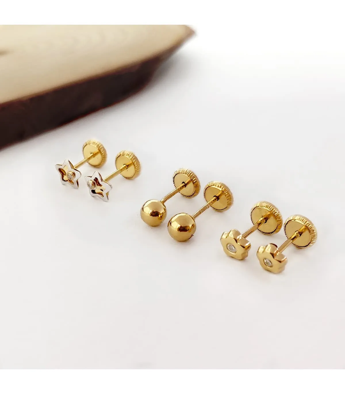 Pendientes Bebé Iria Oro Bicolor 18K estrella 5mm