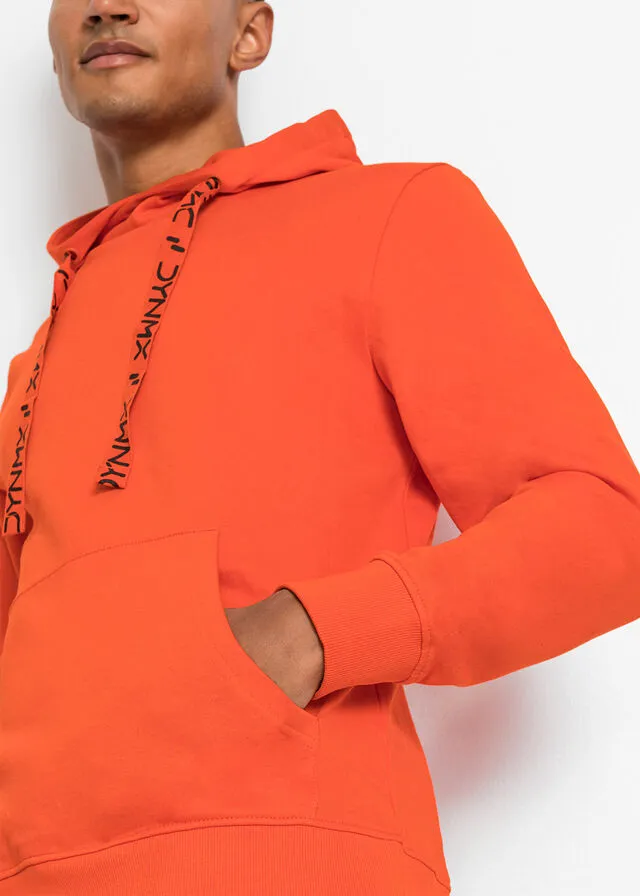 Sudadera de algodón sostenible con capucha naranja sanguina